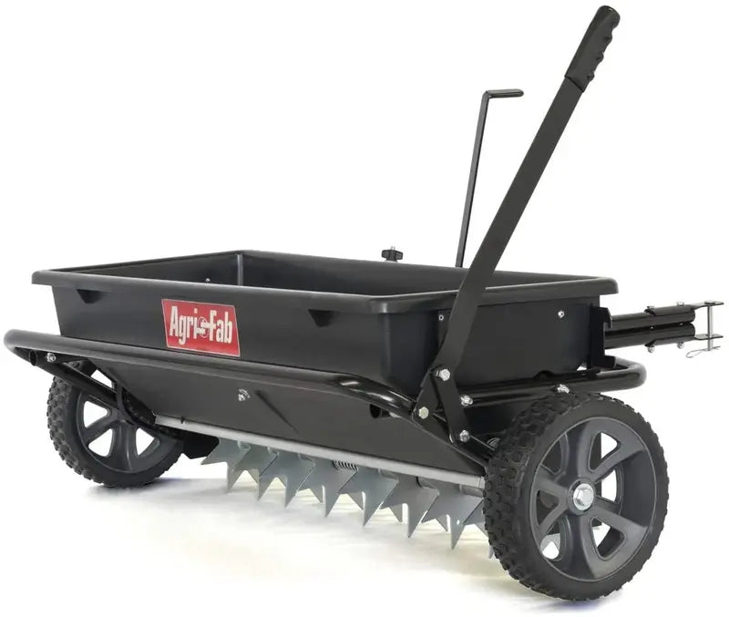 100-Lb Tow-Behind Spreader for Seed. Fertilizer. and Ice Melt ¨C Compatible with Lawn Tractors