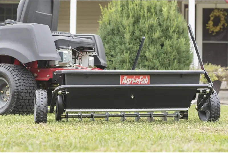 100-LB Traction-Drive Broadcast Seeder & Sprayer ¨C Heavy-Duty Black Utility Spreader for Lawns and Fields