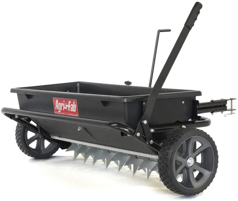 100-Pound Tow-Driven Spiker. Seeder. and Spreader ¨C Black Model 45-0543