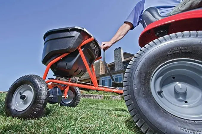 130-Lb Tow-Behind Broadcast Spreader for Lawn Fertilizer and Seed Distribution
