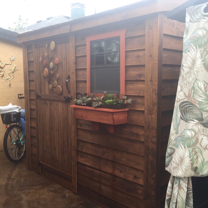 8.5 ft wide x 4.5 ft deep solid wood inclined storage shed